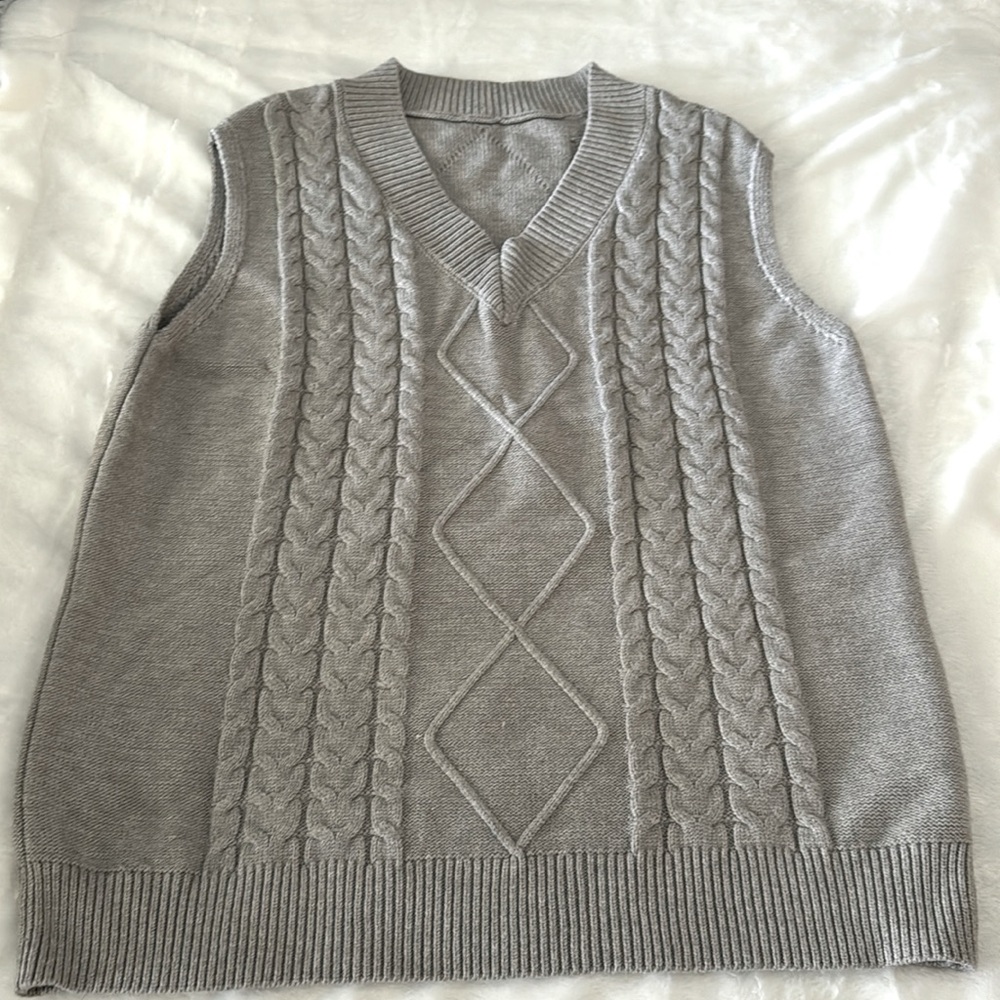 Woman’s sweater vest.  Never worn.